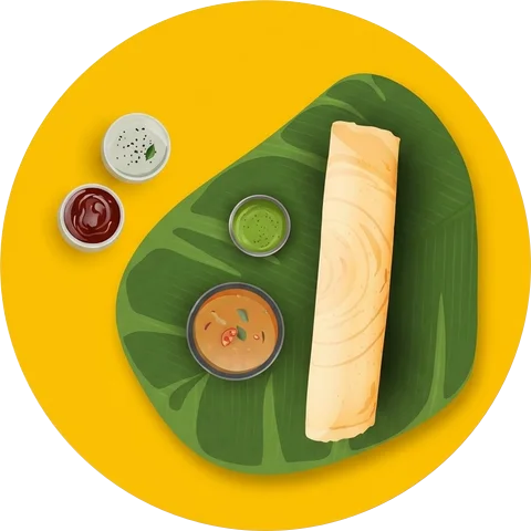 A dosa on a banana leaf with chutneys